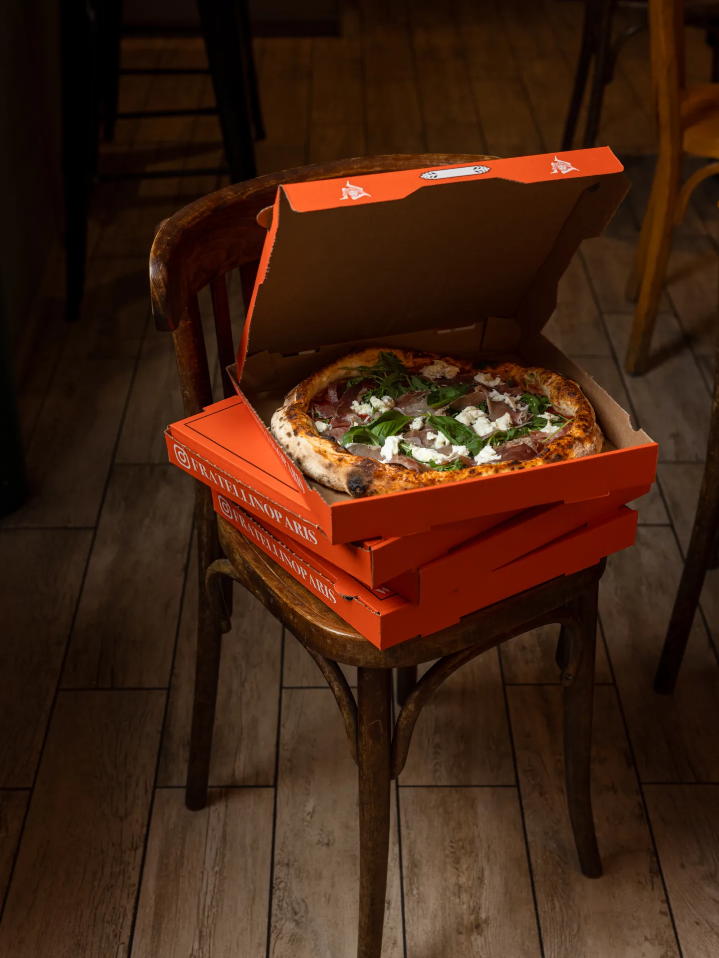Pizza Fratellino en su caja para llevar